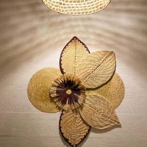 Handcrafted decorative wall mural made of 7 handmade decorative baskets woven from natural Karanday fiber.